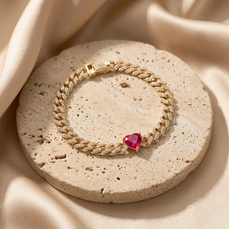 Pink heart curb bracelet on a travertine disc with silk