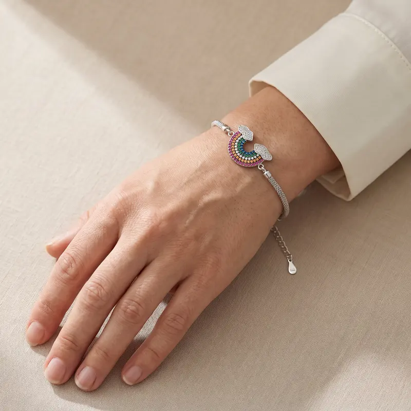 Rainbow mesh bracelet worn on the wrist