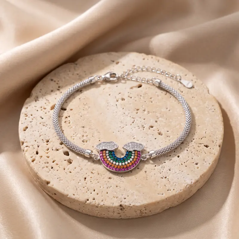 Rainbow mesh bracelet on a travertine disc